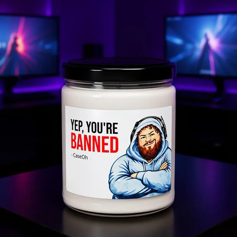 The Yep You're Banned candle, a jar with CaseOh in a hoodie on the label.